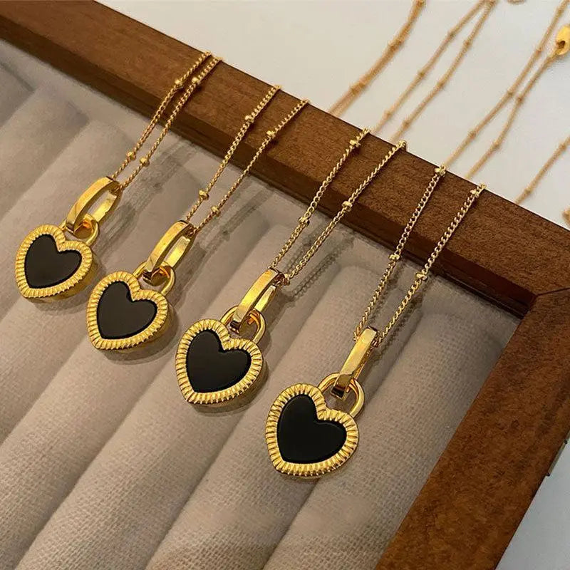 Black and White Heart Necklace in Gold 0