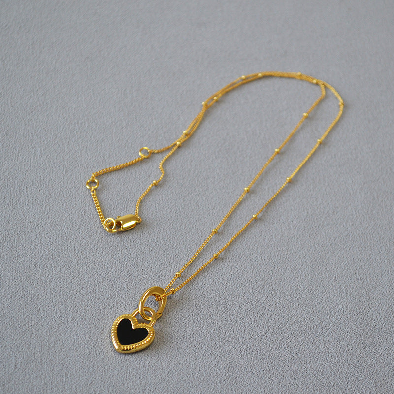 Black and White Heart Pendant Necklace in Gold 2