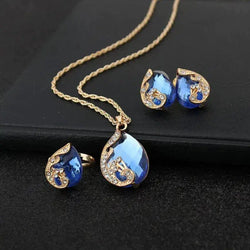 Blue Crystal Necklace + Earring Set in Blue Crystal in Gold 0