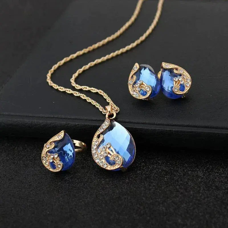 Blue Crystal Necklace + Earring Set in Blue Crystal in Gold 0