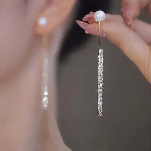 Elegant bright dangling pearl earrings 0