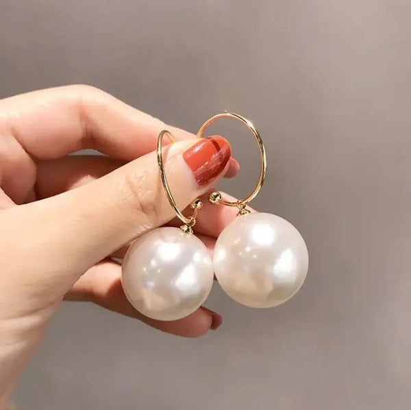 Elegant large pearl earrings 0