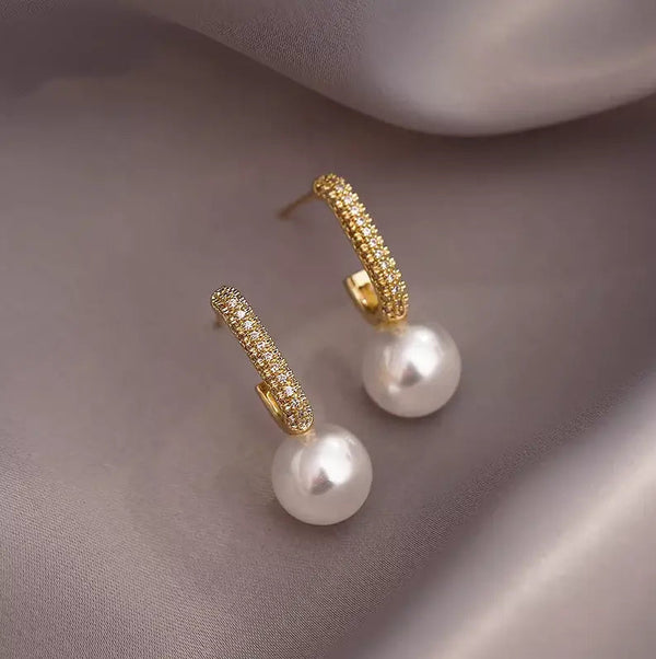 Elegant light gold pearl earrings 0