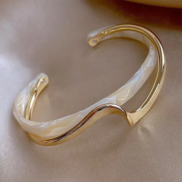 Elegant open bracelet made of white enamel and gold 0