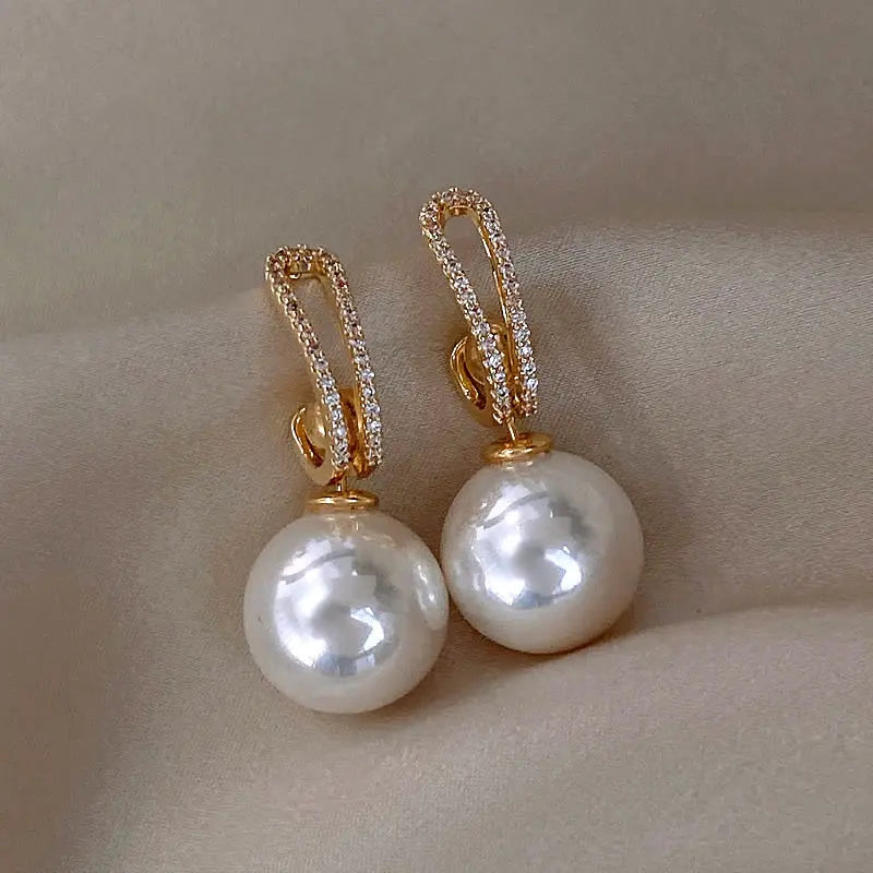 Elegant pearl earrings with zirconias 0