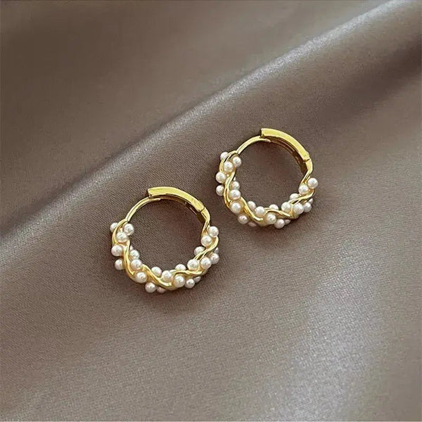Elegant round pearl earrings with inlays 0
