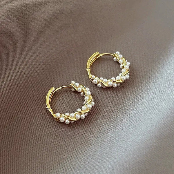 Elegant round pearl earrings with inlays 1