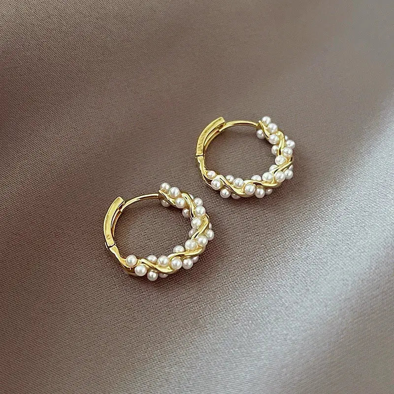 Elegant round pearl earrings with inlays 1