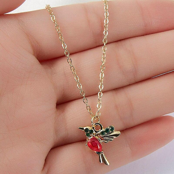 Fine necklace with hummingbird pendant made of enamel and zirconia 1