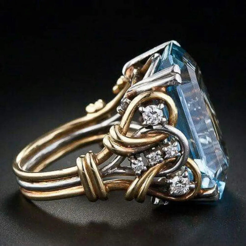 Gold ring with blue zircon in vintage style 0