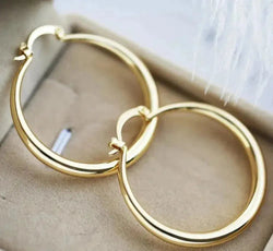 Large hoop earrings in gold 0