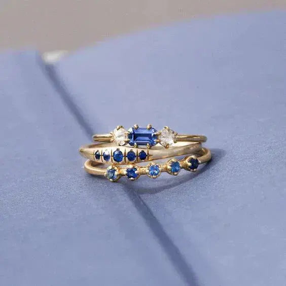 Layered ring with blue zircon 0
