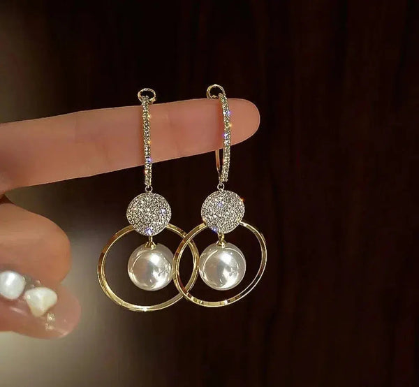 Luxury earrings with cultured pearls and zircons 0