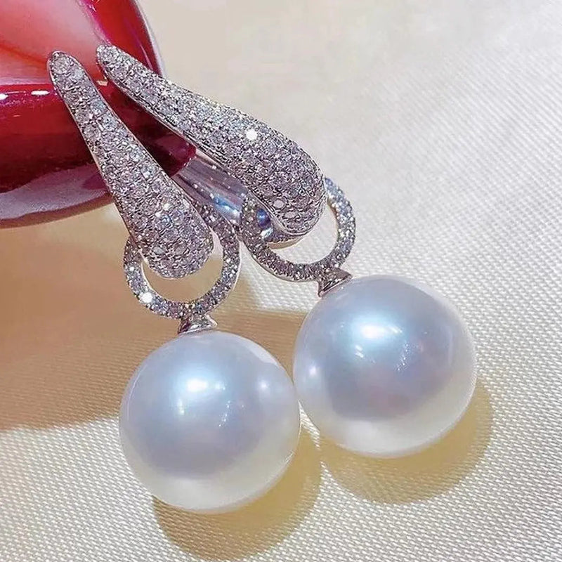 Pearl earrings with zircon in silver 0