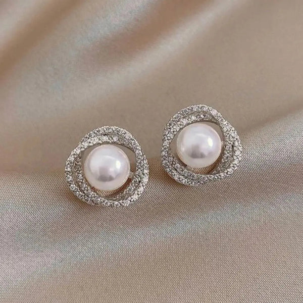 Shiny spiral earrings with elegant pearls 0