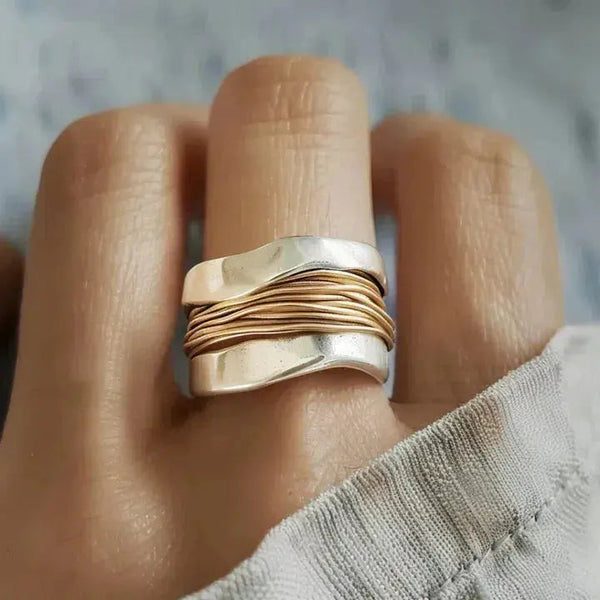 Silver ring with golden threads 0