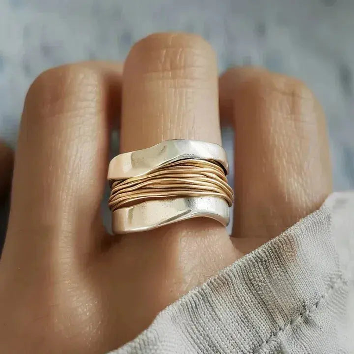 Silver ring with golden threads 0