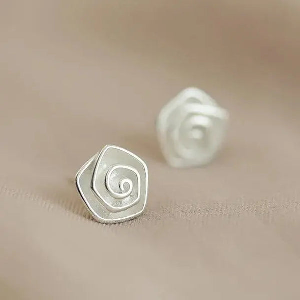 Vintage earrings in the shape of a white flower 0