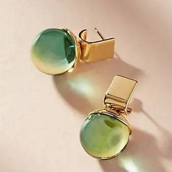 Vintage earrings with green crystal in gold 0