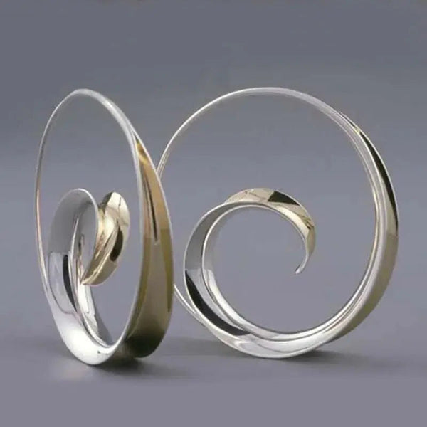 Vintage earrings with spiral waves 0